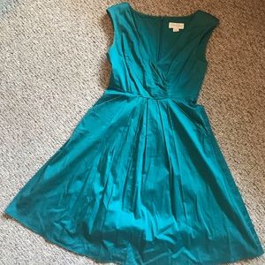 Super cute teal dress with pockets!